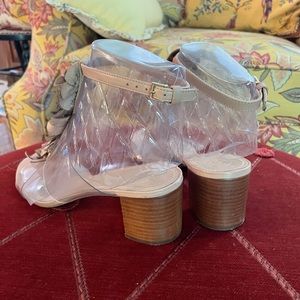 Tory Burch leather blossom mid-heel sandal.